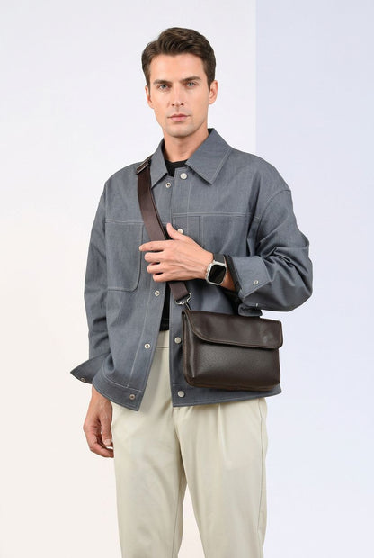 AetherCarry crossbody bag worn by a man, lifestyle shot