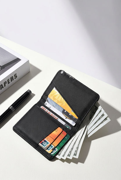 AuraFold wallet in hand showing compact size