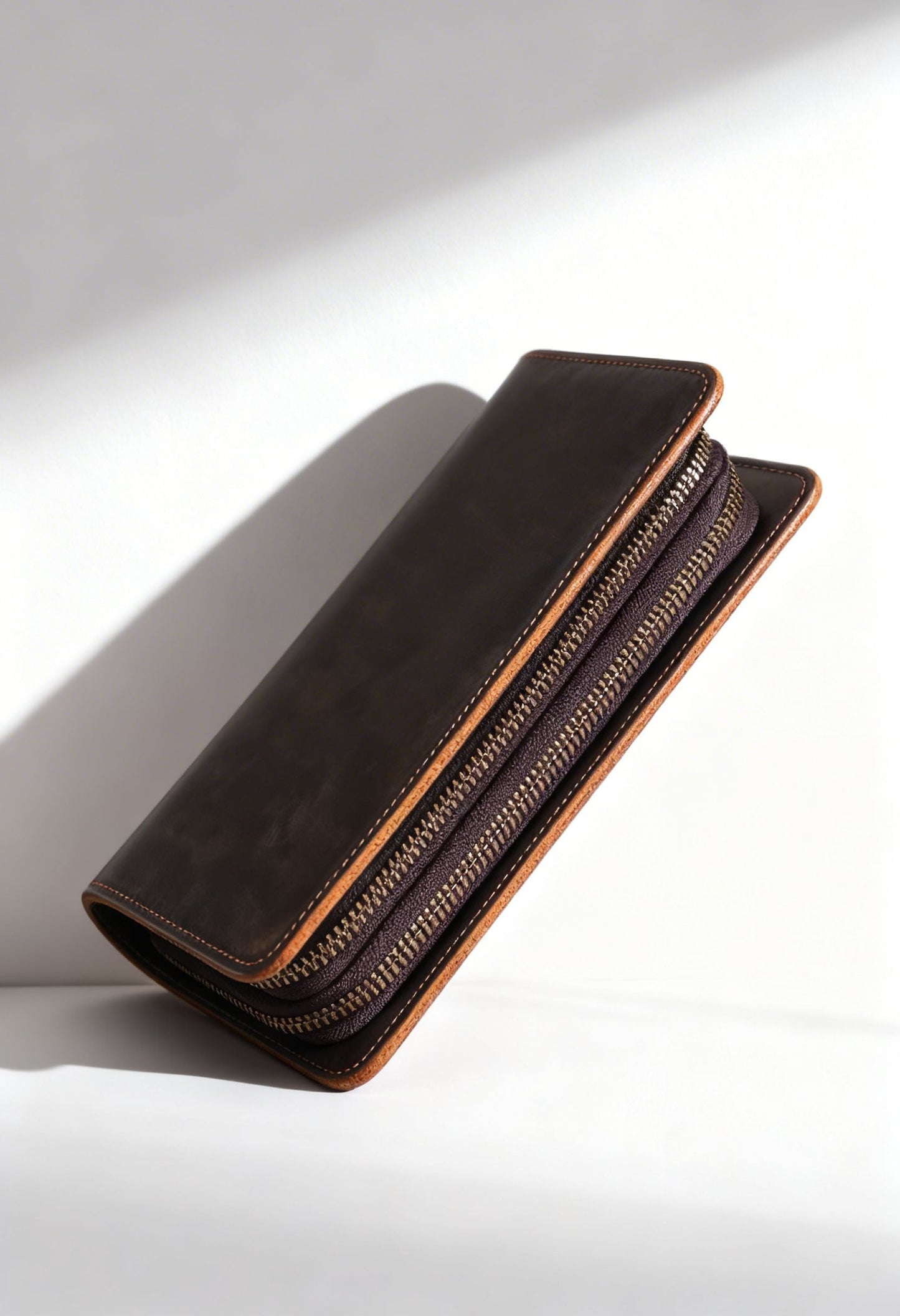 Detail of the genuine leather texture on the vintage clutch wallet