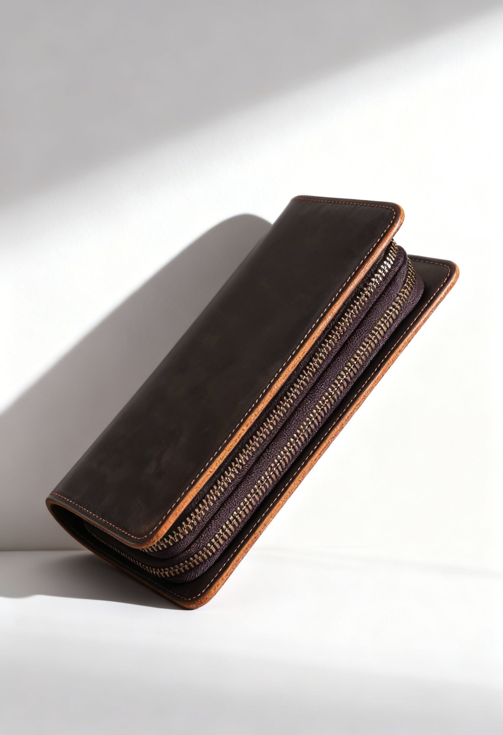 Detail of the genuine leather texture on the vintage clutch wallet