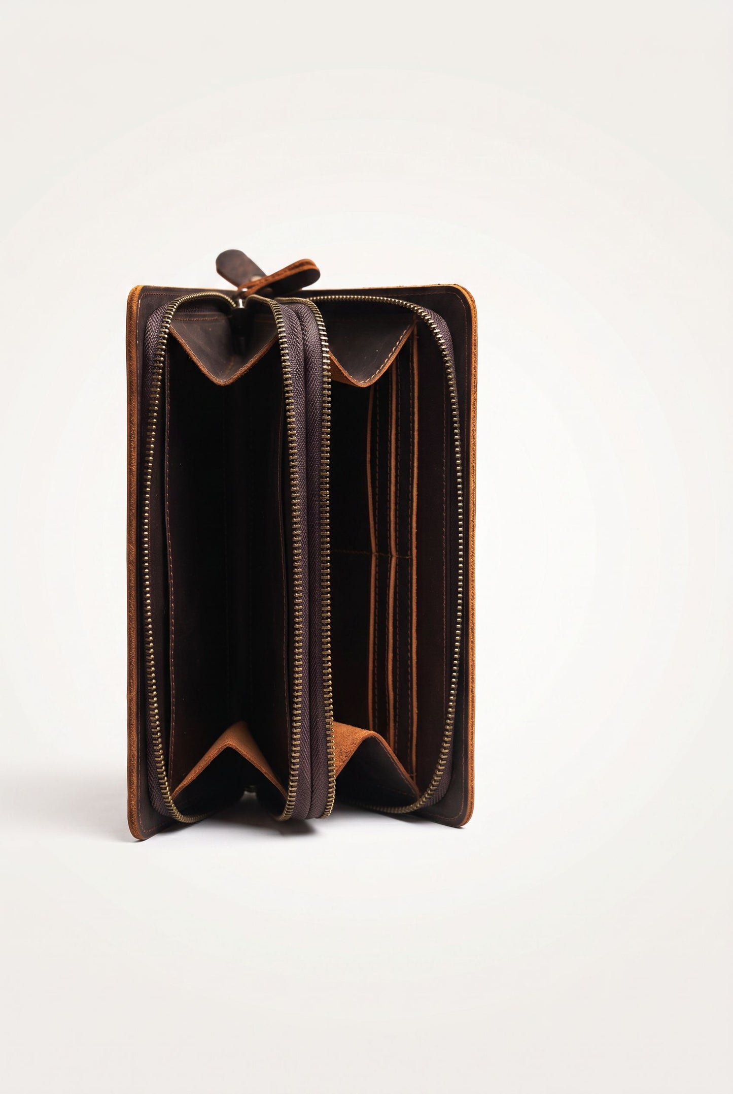 Detail of the genuine leather texture on the vintage clutch wallet
