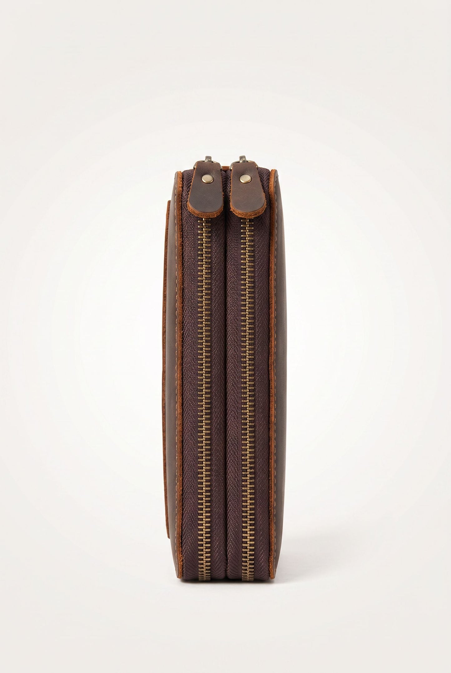 Detail of the genuine leather texture on the vintage clutch wallet