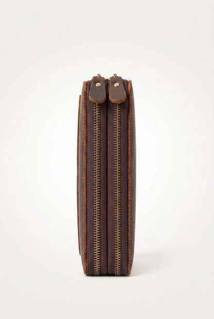 Detail of the genuine leather texture on the vintage clutch wallet
