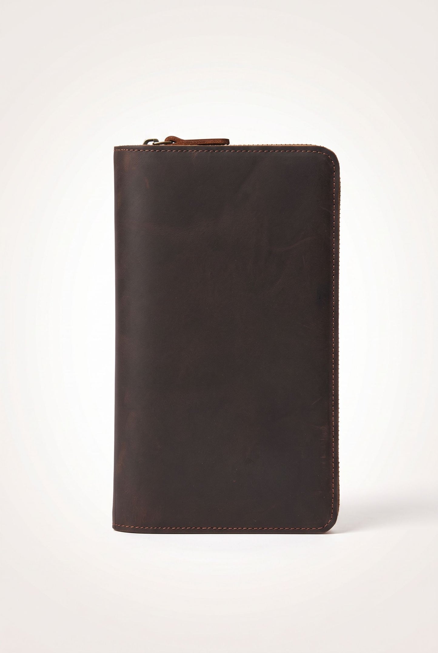 Detail of the genuine leather texture on the vintage clutch wallet