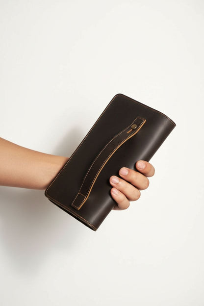 Open genuine leather long wallet, showing card slots and compartments