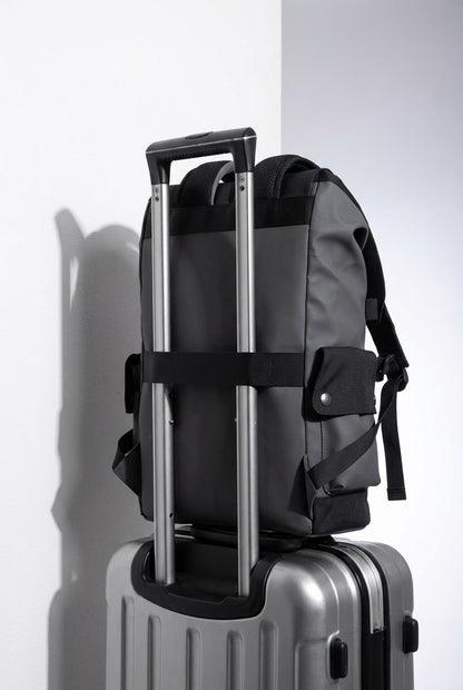 Man walking with premium men's backpack, urban setting