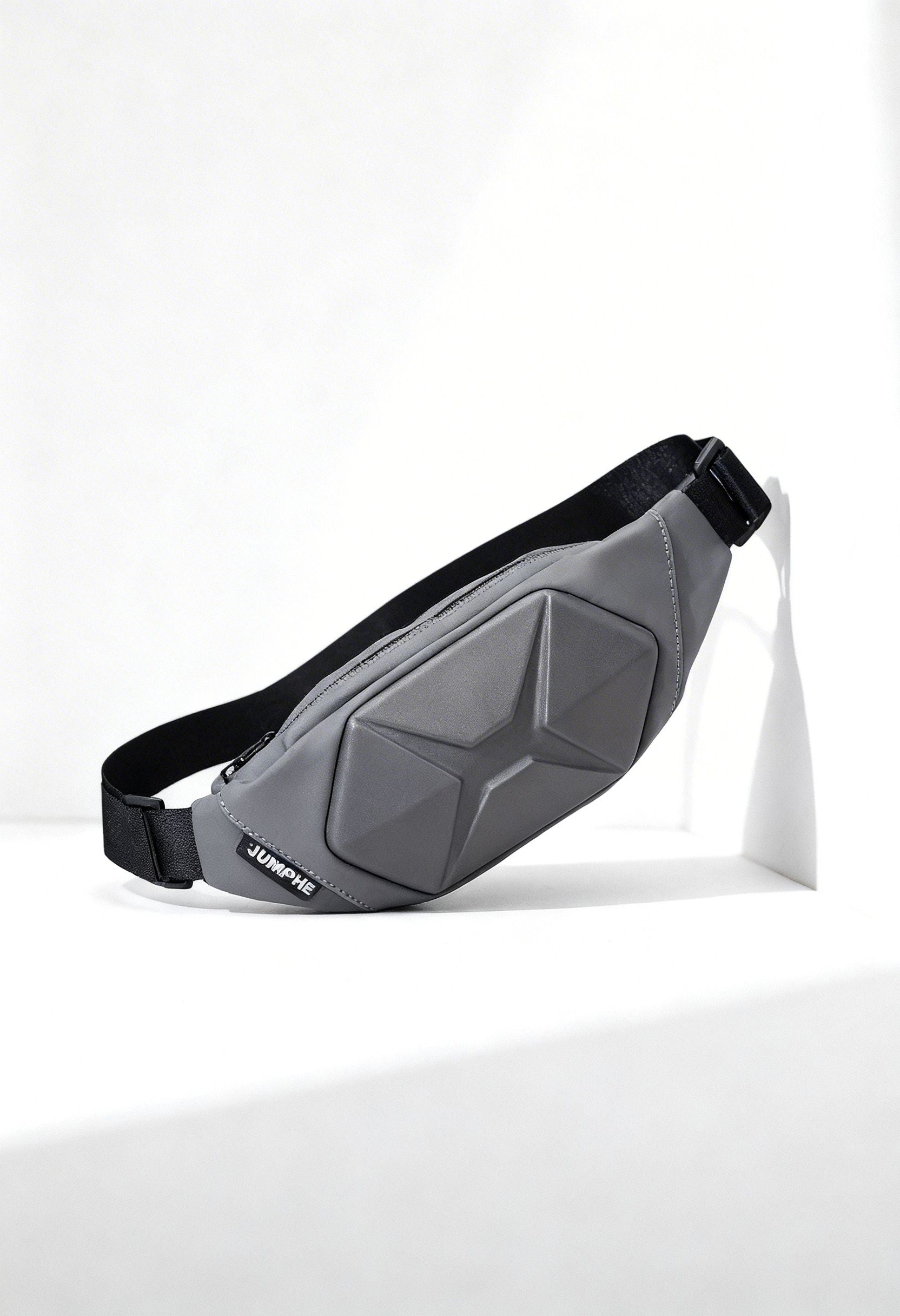 Angled view of the waterproof waist pack, showcasing its durable material and secure zippers.